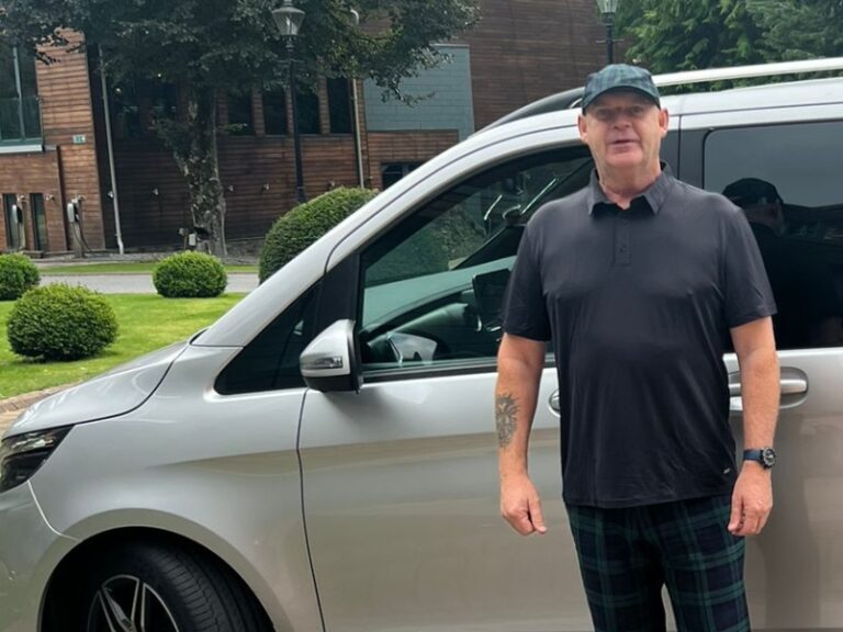 Pitlochry Transfers & Tours owner with tour vehicle