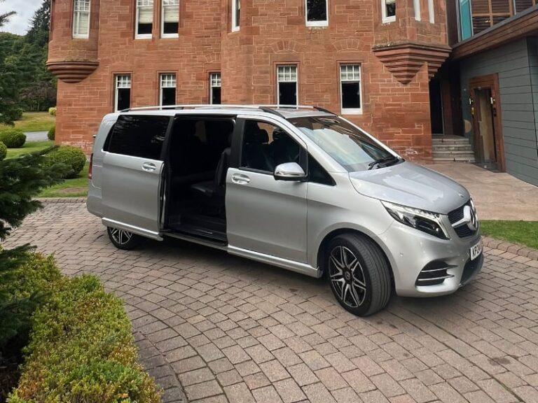 Mercedes V Class tour vehicle showing side door open to access vehicle