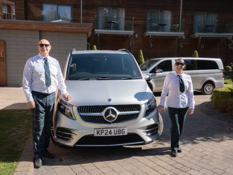 Pitlochry Transfers & Tours proudly stand with two of their fleet of luxury vehicles