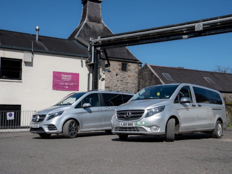 Vehicles awaiting clients after Dewars Distillery tour and tasting experience