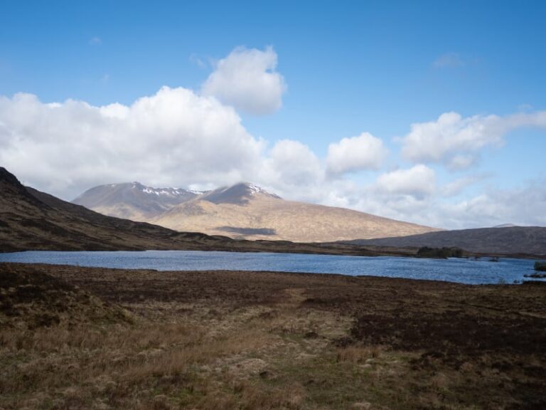 Blue sky and snow covered mountains in Scotland