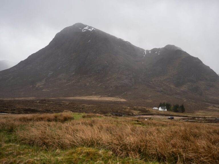 Remote cottage at foot of Scottish Mountain